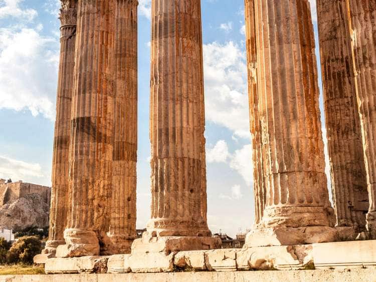Greece, Central Greece and Euboea, Attica, Athens, Pillars of The Temple of Olympian Zeus, with the Acropolis in the background