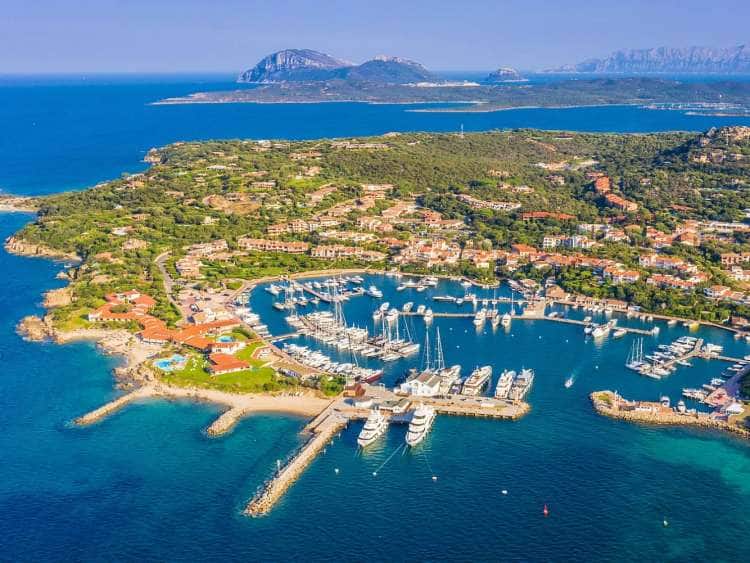 Aerial view Golfo Aranci, a port visited on an all-inclusive, luxury Seabourn cruise.