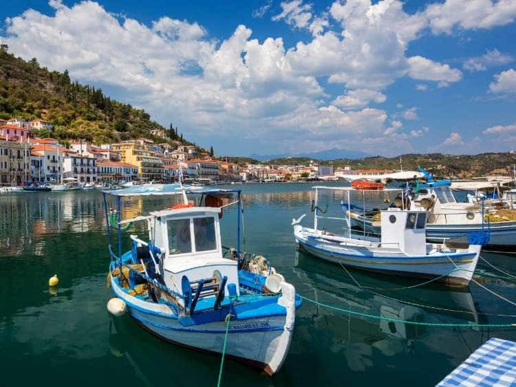 Boats in the harbor of Gythion, Greece, a port visited on an all-inclusive, luxury Seabourn cruise.