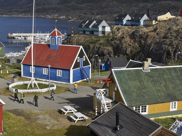 Colorful houses in Sisimiut, Greenland, a port seen on an all-inclusive, Seabourn luxury cruise.