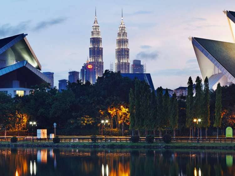 Malaysia, Selangor, Kuala Lumpur, Petronas Towers and Lake Titiwangsa