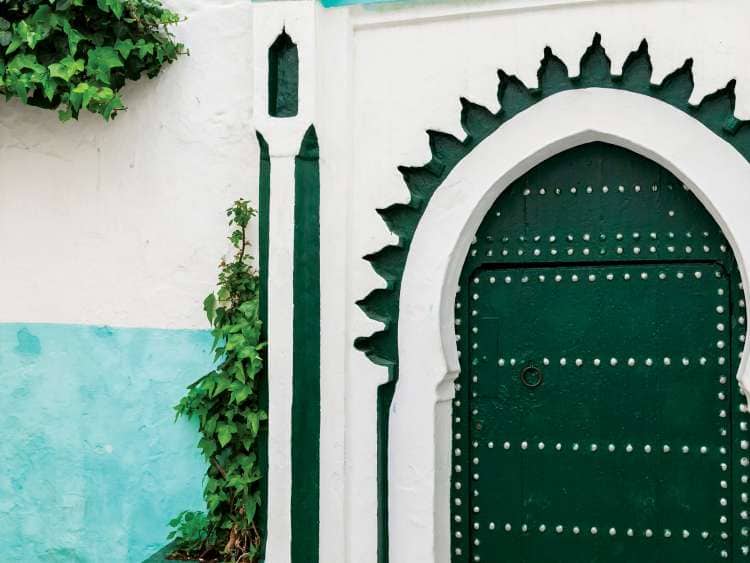 DYB3A6 Green wooden gate of ancient mosque in Medina. Tangier, Morocco