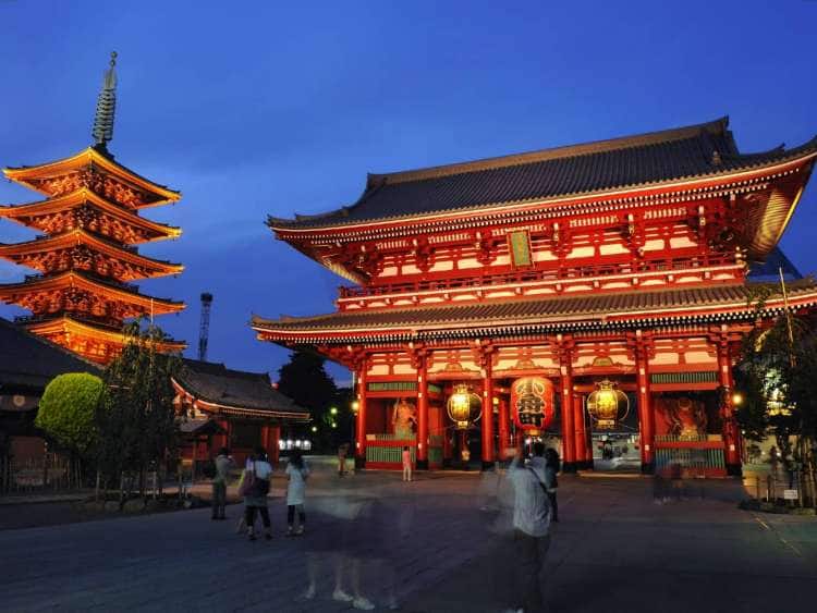 Senso-ji Temple illuminated at dusk in Tokyo, Japan, a port visited on an all-inclusive, luxury Seabourn cruise.