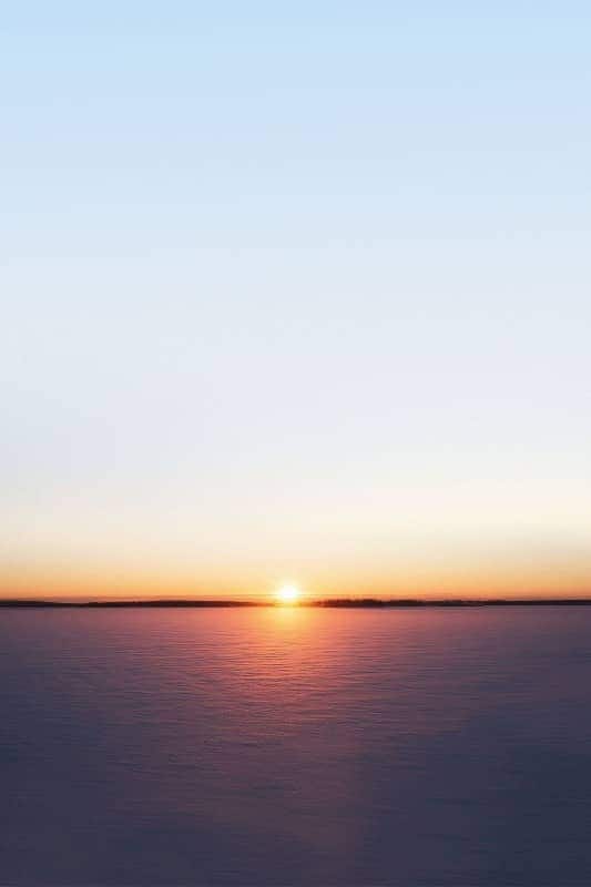 Image of sun setting in horizon