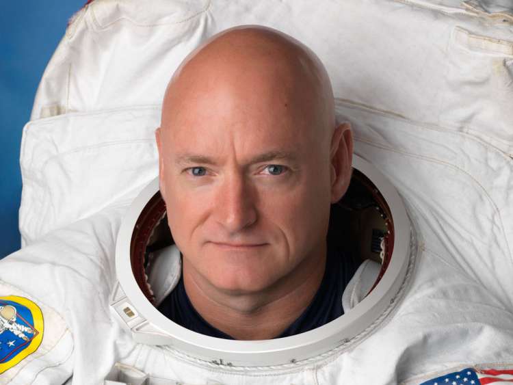 Official portrait of Expedition 45/46 long duration astronaut Scott Kelly in EMU.  Photo Date: August 11, 2014.  Location: Building 8, Room 183 - Photo Studio.  Photographer: Robert Markowitz