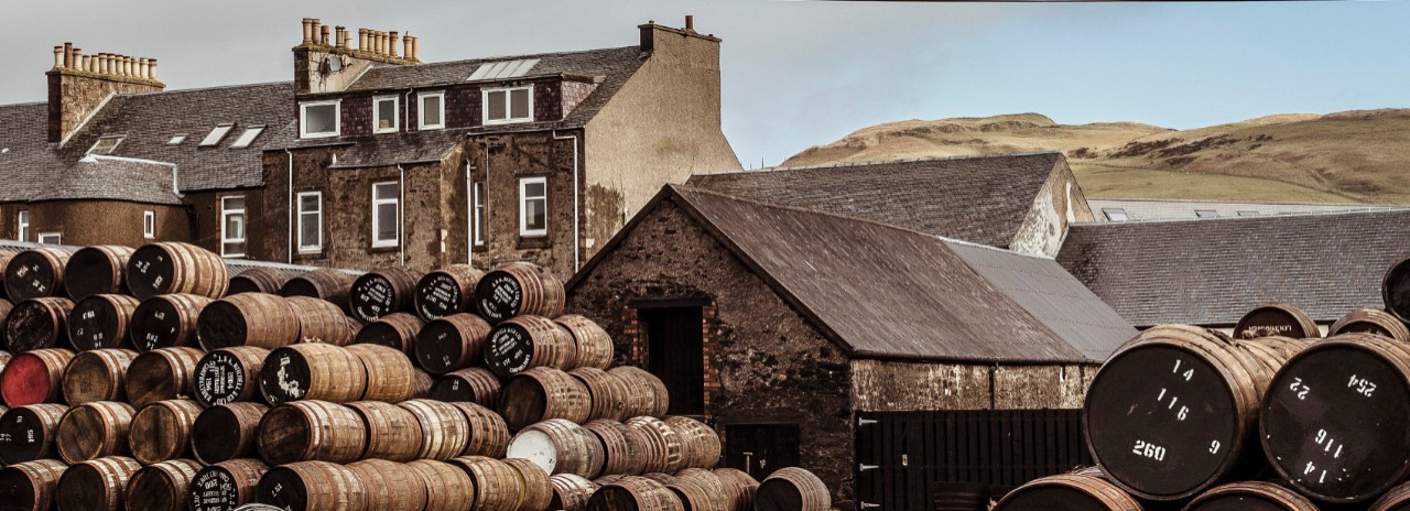 UK, Scotland, Argyll, Campbeltown, whisky barrels outside the Springbank whisky distillery