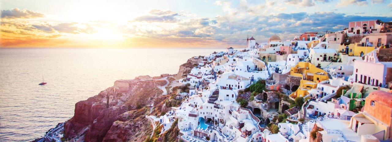 Sunrise aerial view of Santorini, Greece which can be seen on a Seabourn Luxury cruise to Greece Islands on the Aegean Sea