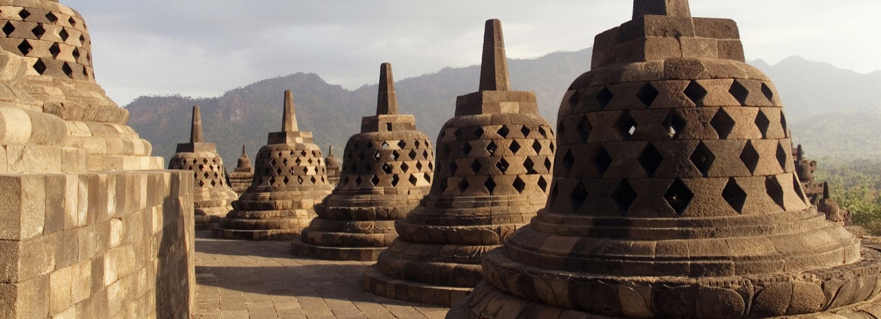 Indonesia, Java, Terrace with pierced stupas containing the statue of Buddha in the temple of Borobudur, 40 Km. at west of Yogyakarta.