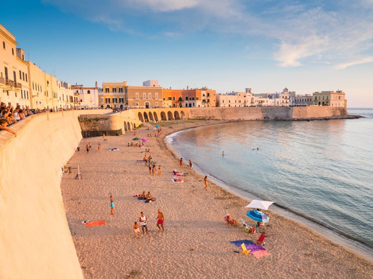 Beach along the waterfront in Gallipoli, Italy, a port visited on an all-inclusive, luxury Seabourn cruise. 