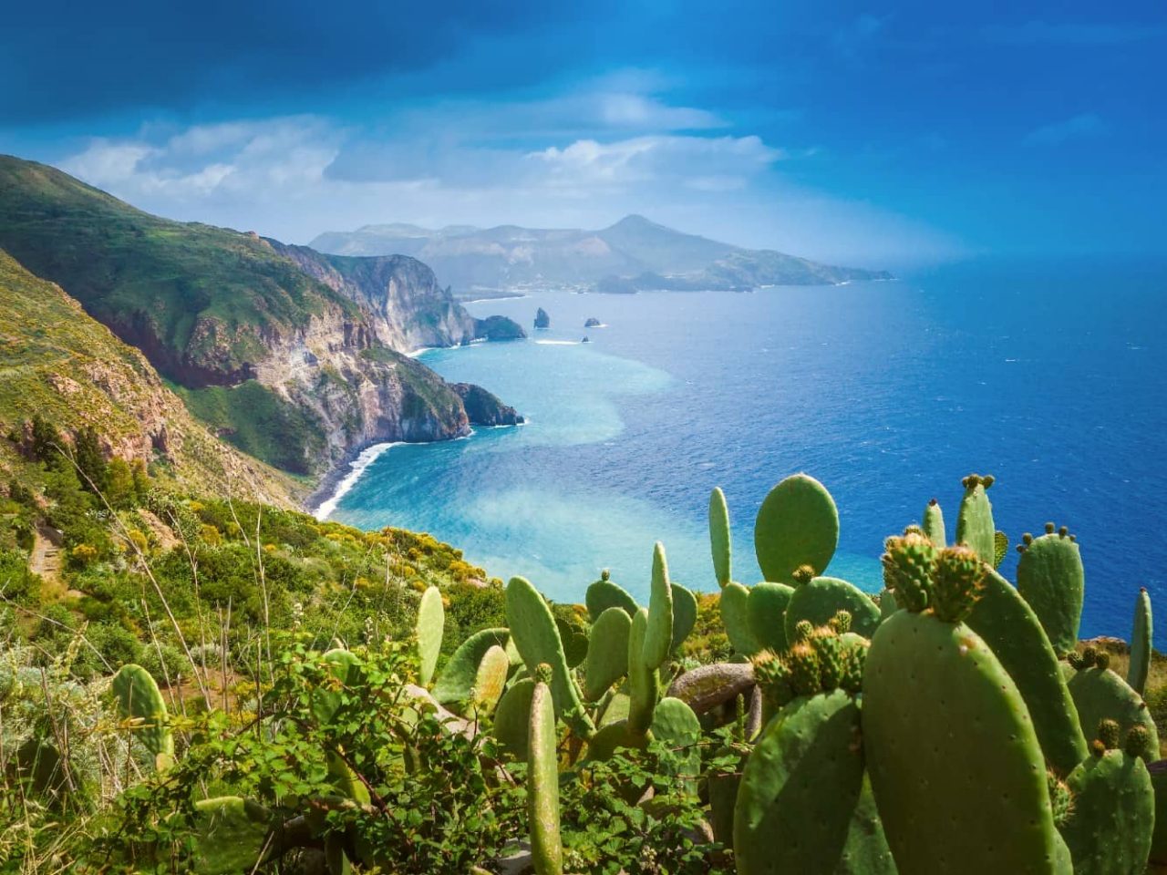 View of Vulcano Island from Lipari Island, Italy, a port visited on an all-inclusive, luxury Seabourn cruise. 