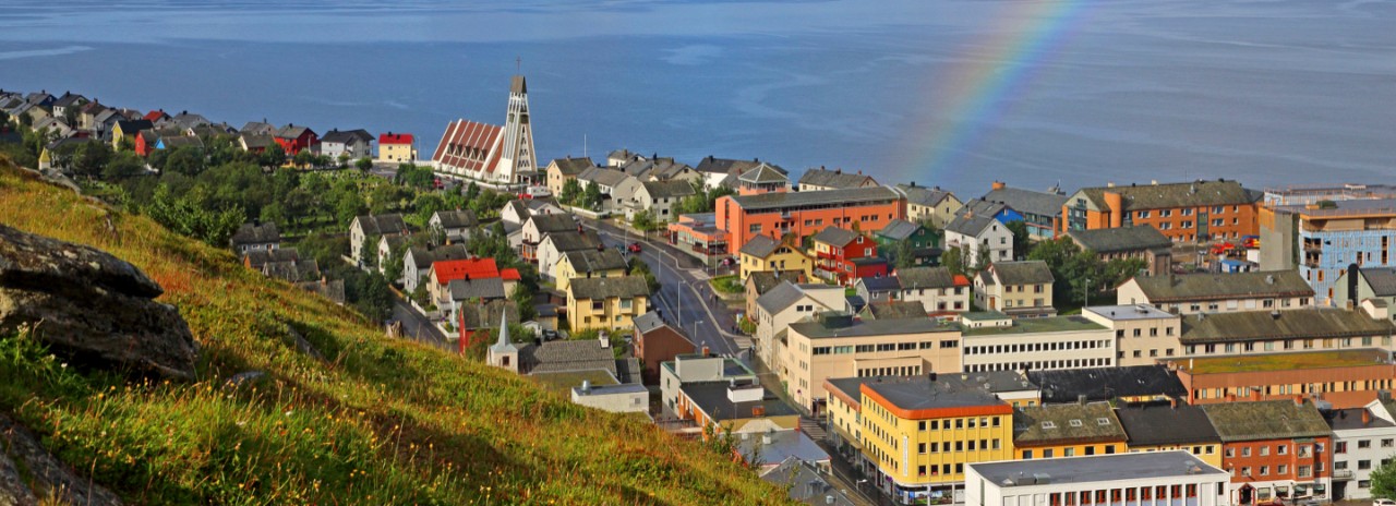 Norway, Finnmark, View of Hammerfest on the Arctic Ocean with Rainbow