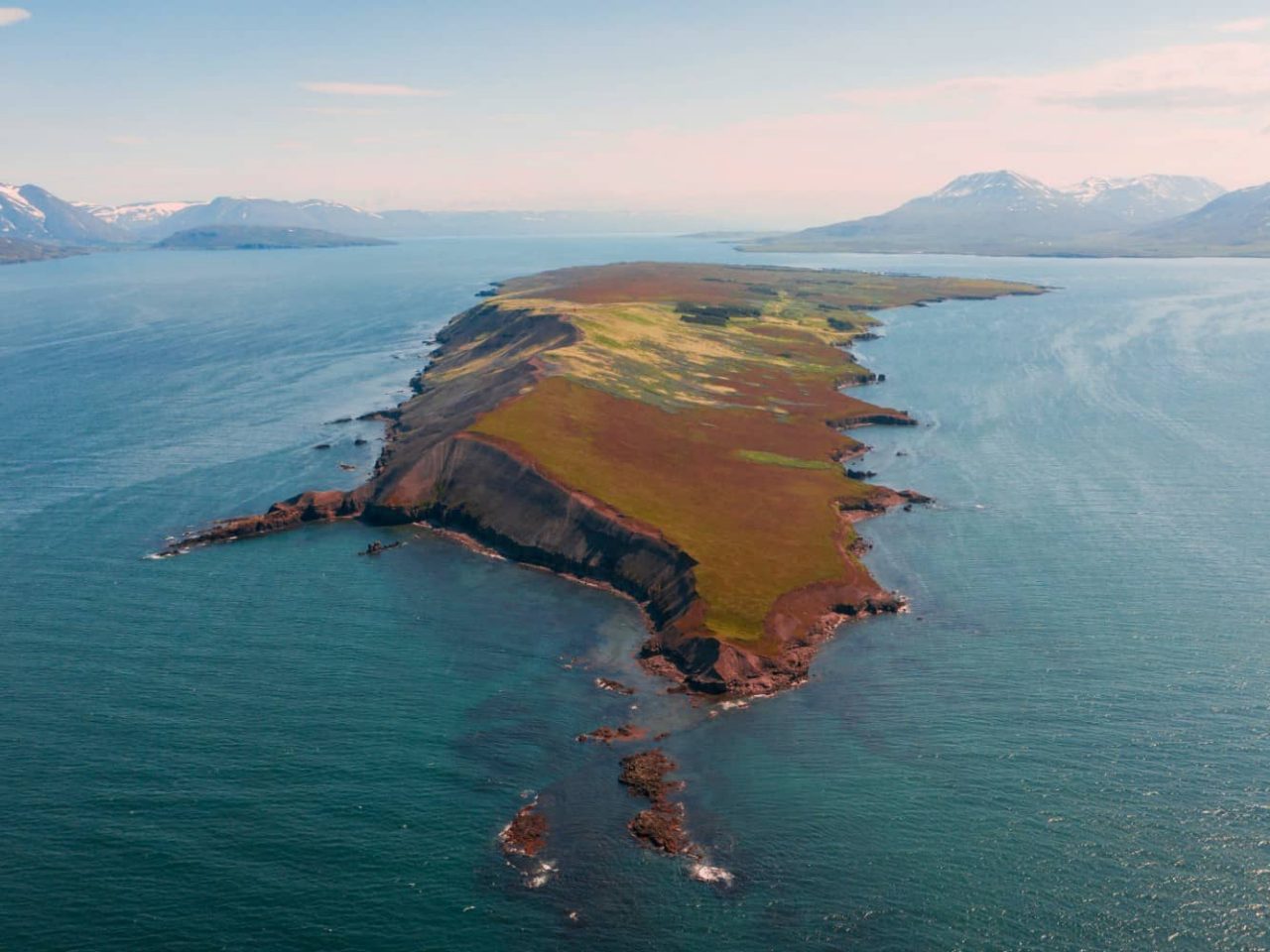 Aerial view of the Icelandic island, Hrisey, a port visited on an all-inclusive, luxury Seabourn cruise. 