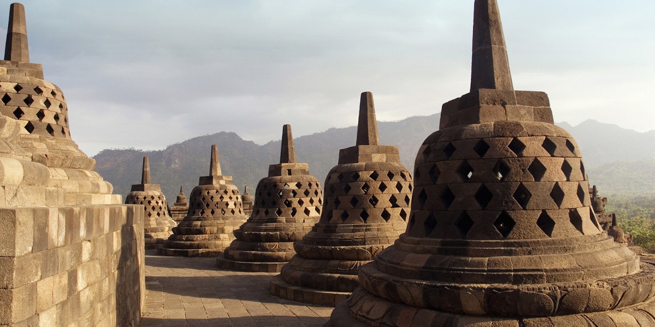 Indonesia, Java, Terrace with pierced stupas containing the statue of Buddha in the temple of Borobudur, 40 Km. at west of Yogyakarta.