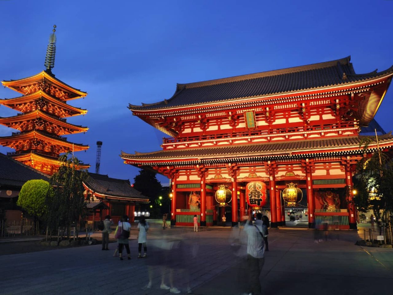 Senso-ji Temple illuminated at dusk in Tokyo, Japan, a port visited on an all-inclusive, luxury Seabourn cruise. 