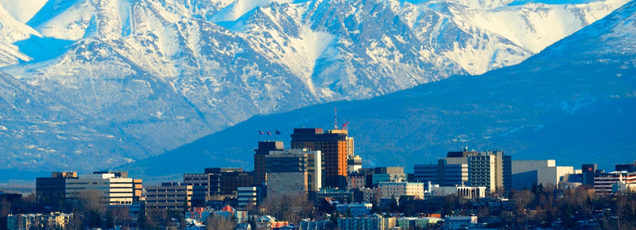 Skyline of the city of Anchorage with Chugach Mountains in the back, Alaska, USA