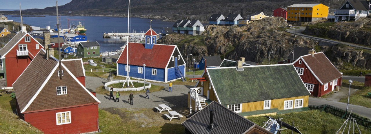 Colorful houses in Sisimiut, Greenland, a port seen on an all-inclusive, Seabourn luxury cruise. 