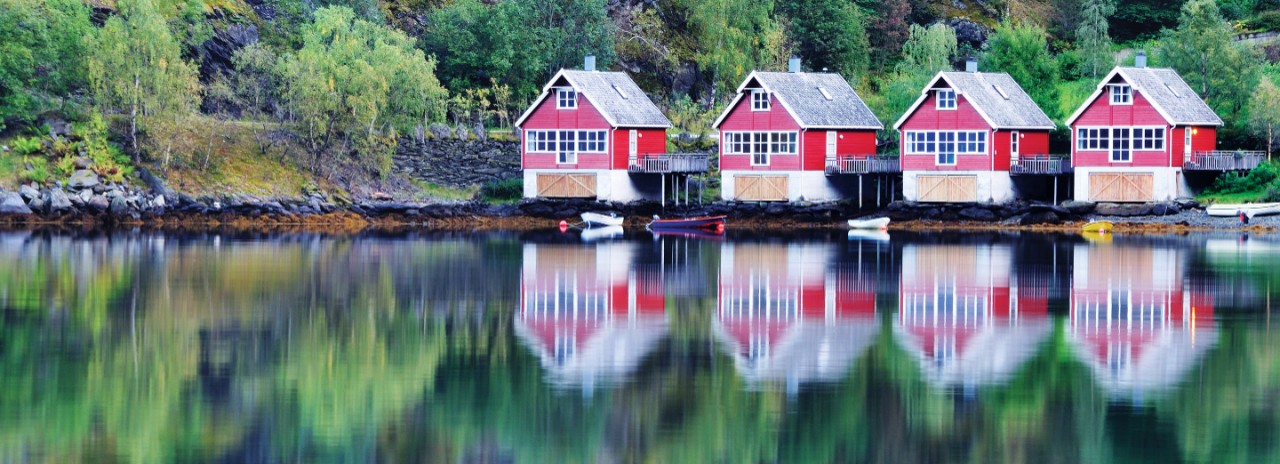Scenic View of lake and fishing huts in Flam, Norway.