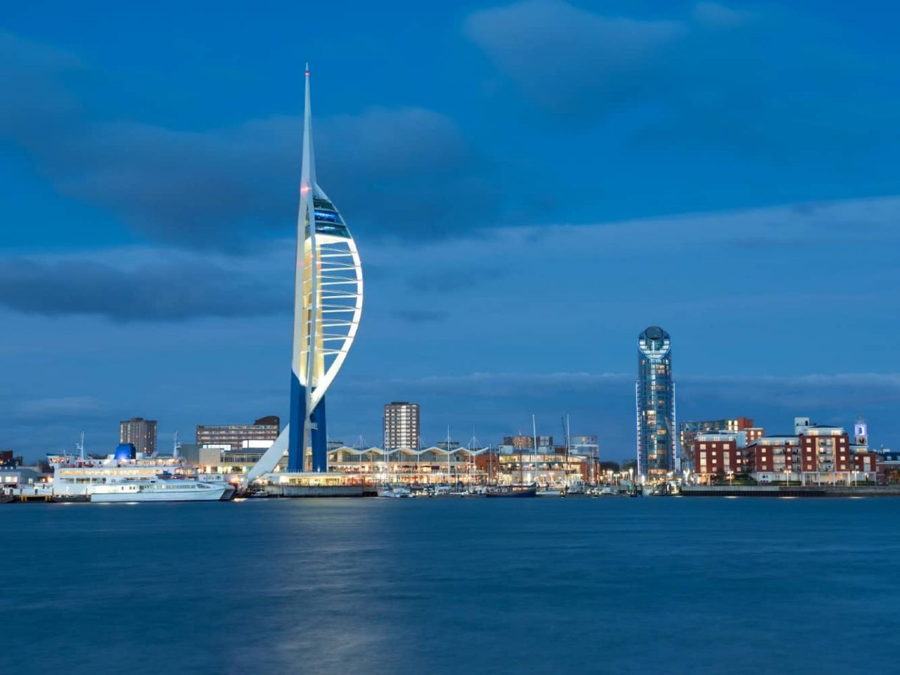 Waterfront and Spinnaker Tower in Portsmouth, United Kingdom, a port visited on an all-inclusive, luxury Seabourn cruise. 