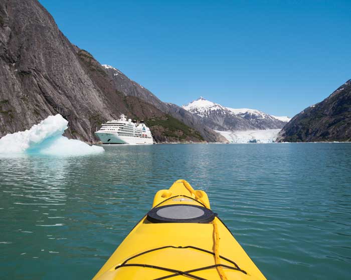 Kayaking towards Seabourn Sojourn - Endicott Arm, Alaska